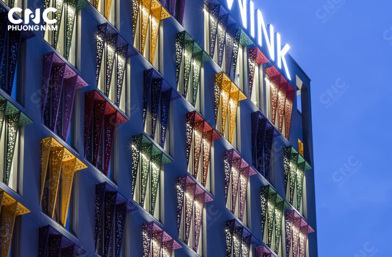 PHUONG NAM PANEL | PNP FAÇADE COMBINES VIBRANT LIGHT EFFECTS FOR WINK HOTEL